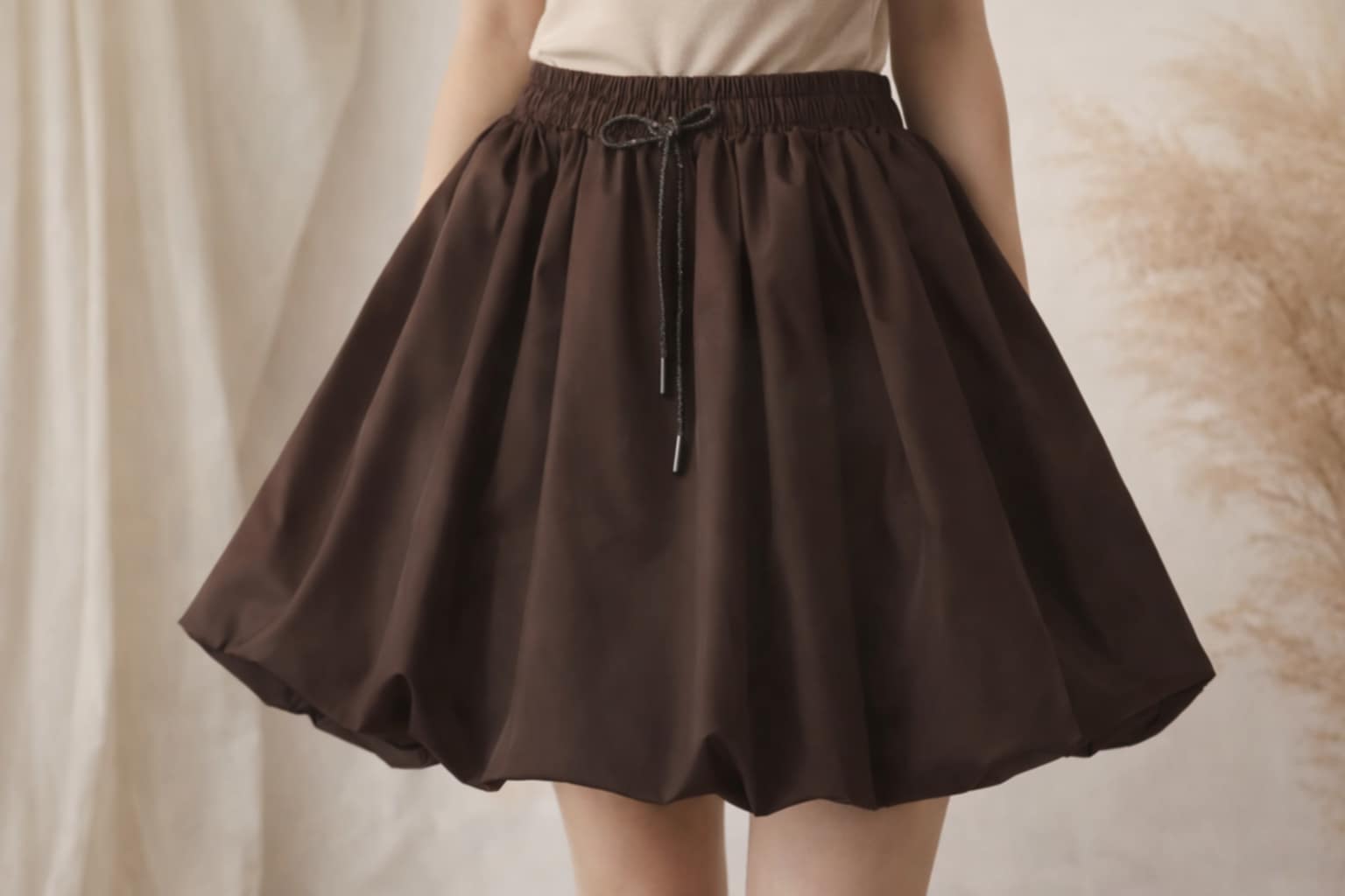 Balionėlio modelio sijonas.